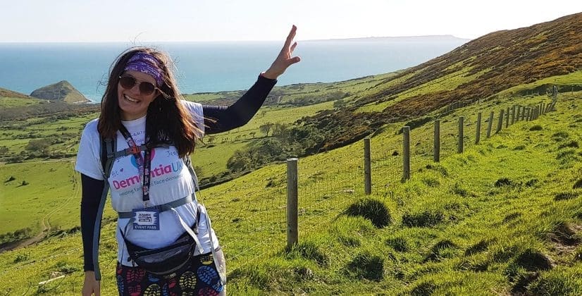 A woman poses as she walks the south west coast