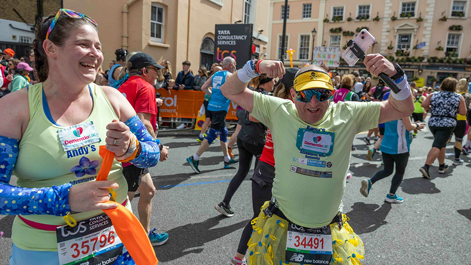 Andy and Christine laugh as they take part in the London Marathon