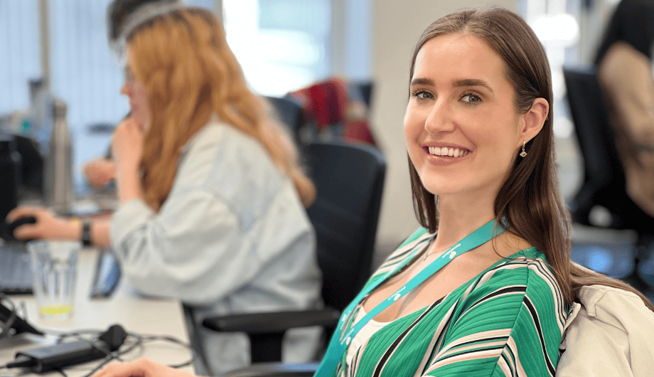 Abby, Dementia UK Content Manager at her desk in the Dementia UK Office