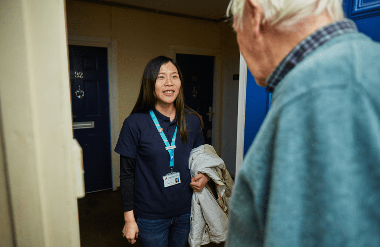 Admiral Nurse Emily at a person's front door that she is supporting