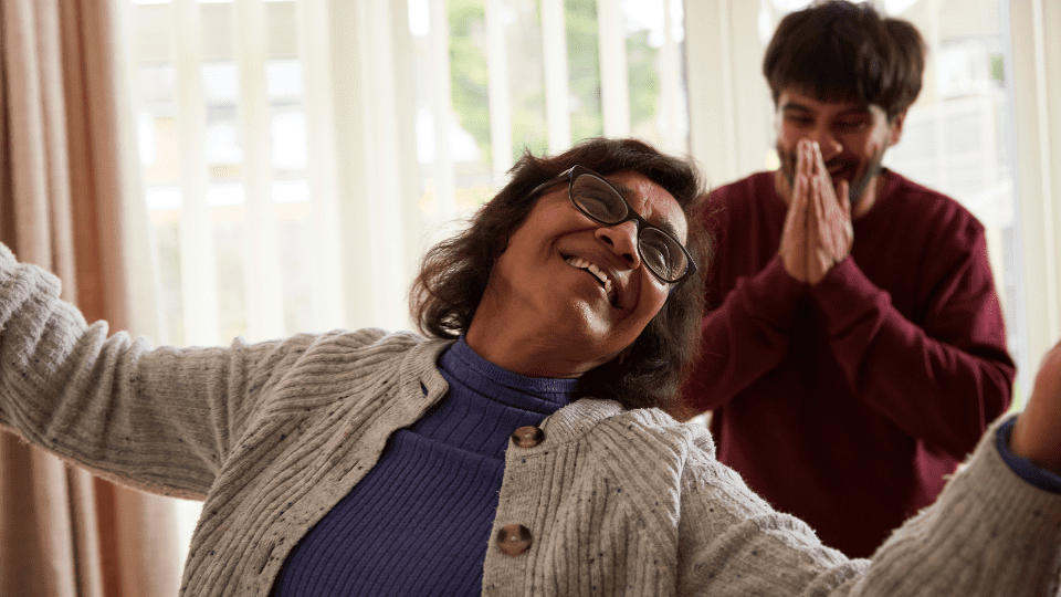 Mother and son dancing