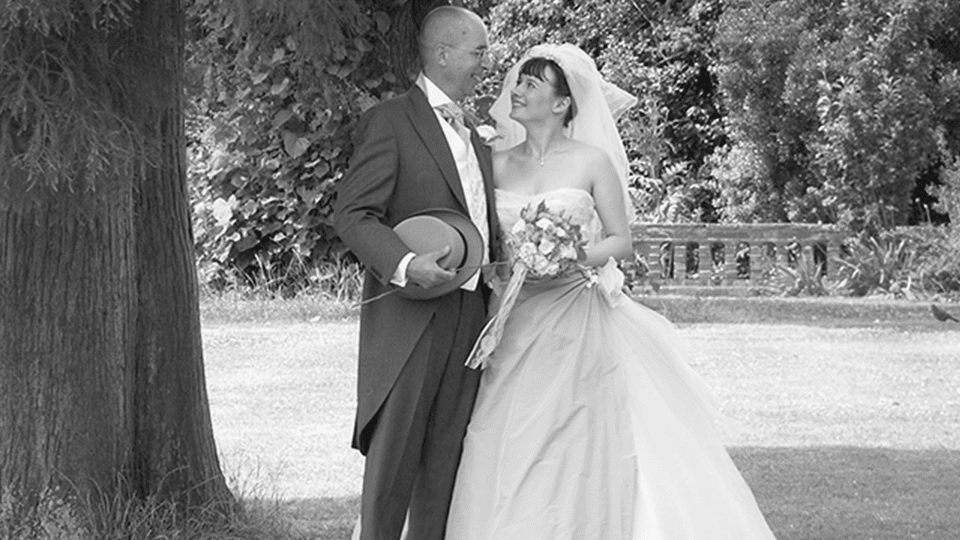 Charles and Kerry look into each other's eyes on their wedding day