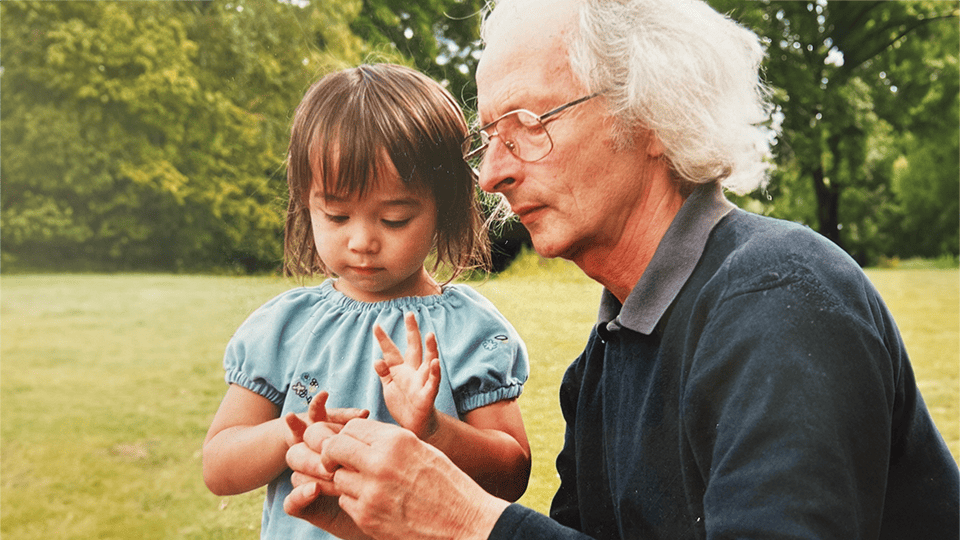 Ralph, who lives with dementia, plays with granddaughter Saina.