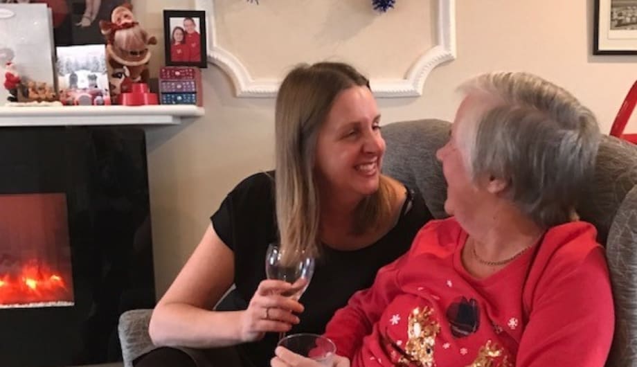 Suzy and her mum sat down smiling at each other