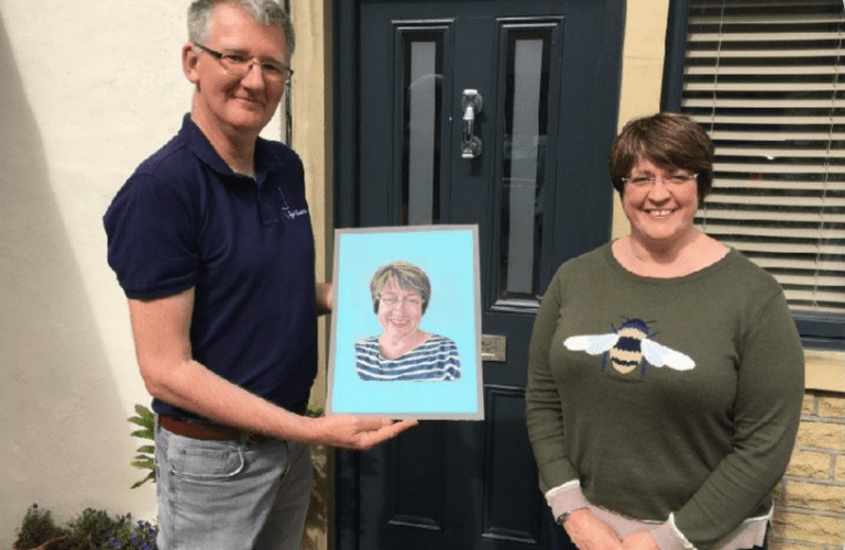 Nigel, Admiral Nurse Rachel and the portrait he painted of her