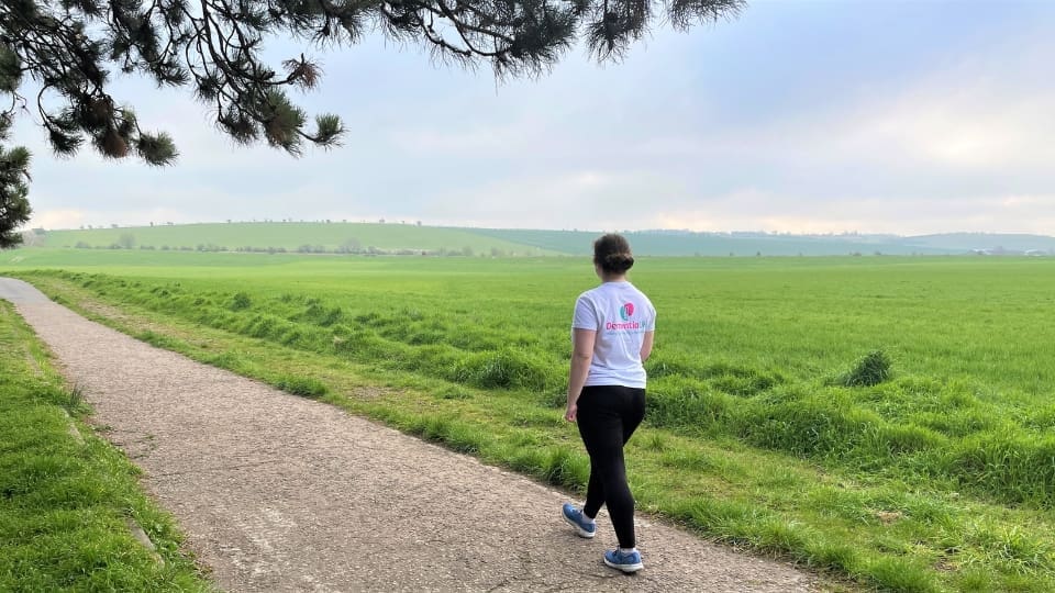 Supporter walking and wearing a Dementia UK branded t-shirt