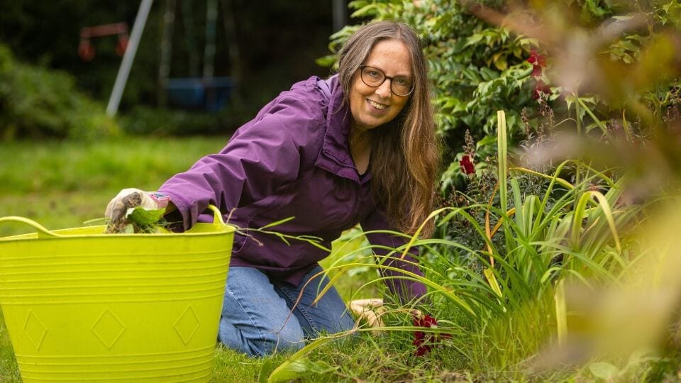 middle aged woman gardening