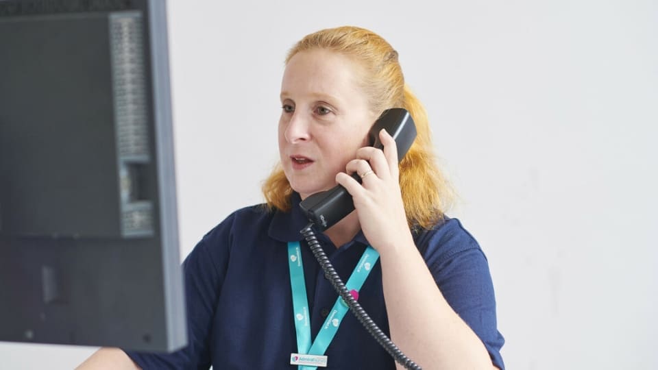 Admiral Nurse Judy taking a call to the Helpline