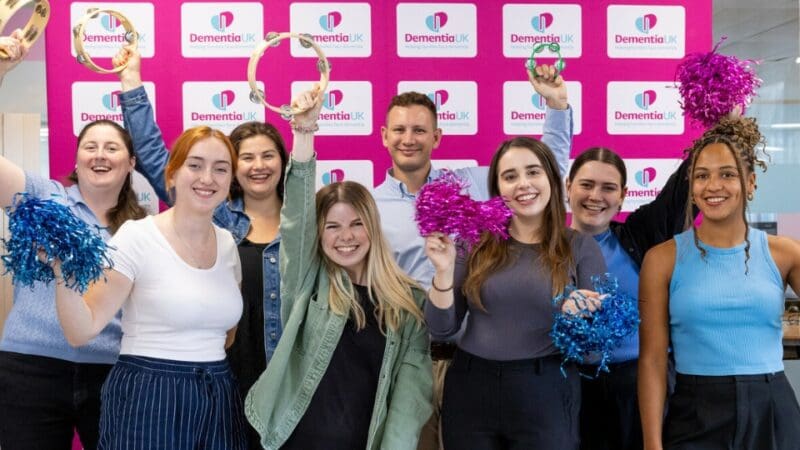 fundraising team with cheering props