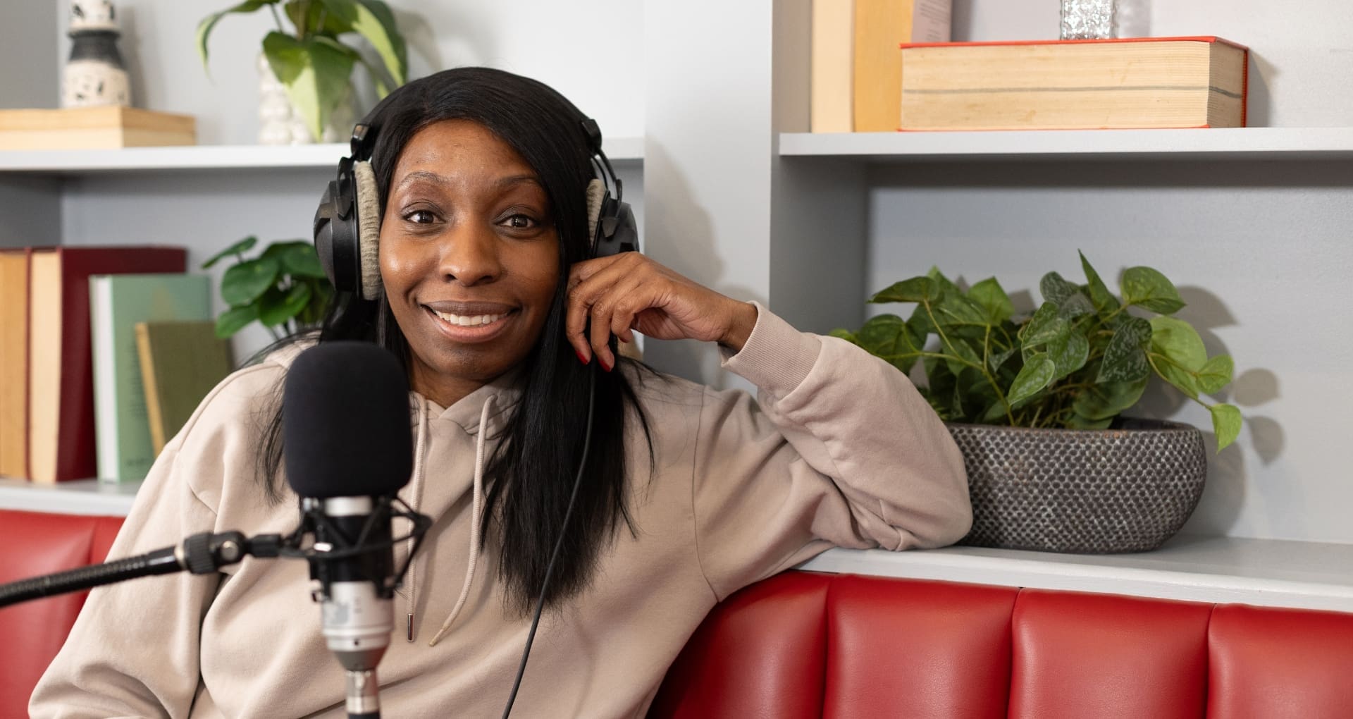 storyteller michaela williams in podcast recording studio