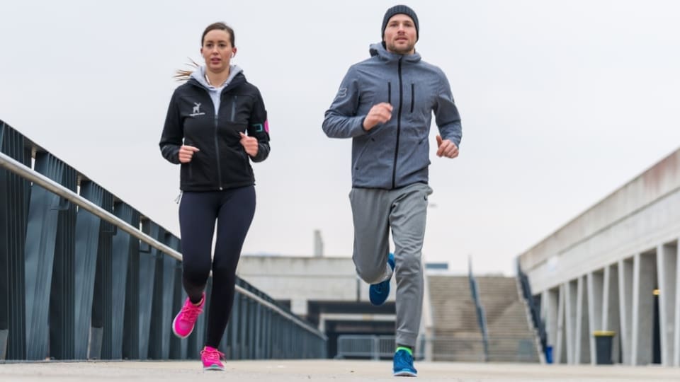 woman and man running