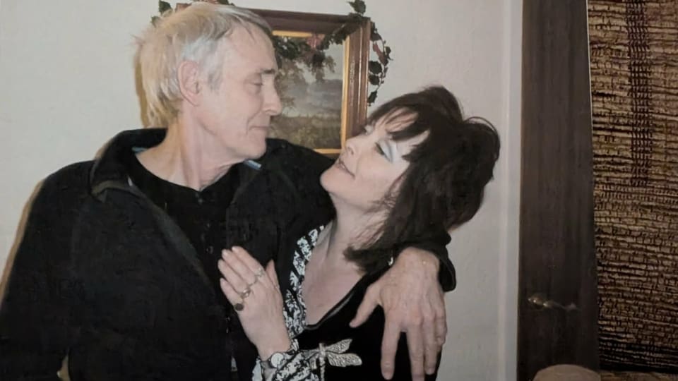 storyteller jon's mum and dad embracing