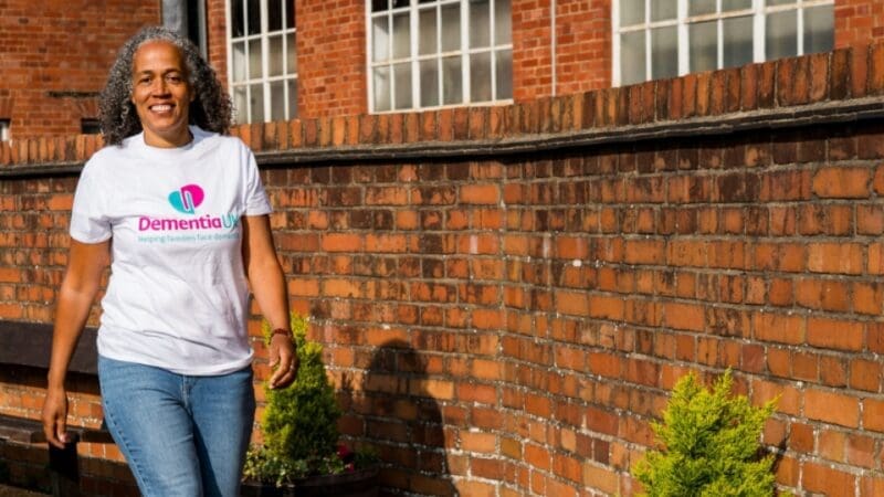 supporter walking for Dementia UK wearing Dementia UK t-shirt