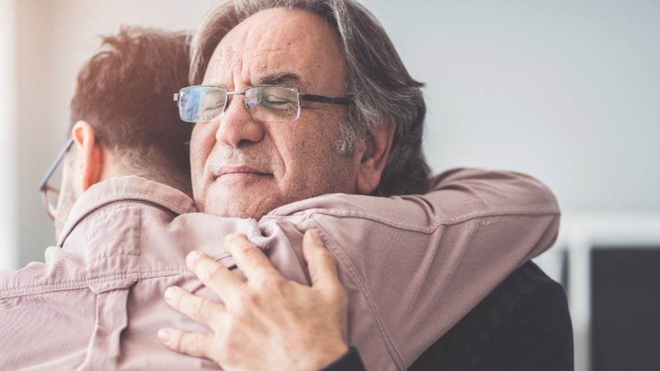 model shoot of two people embracing