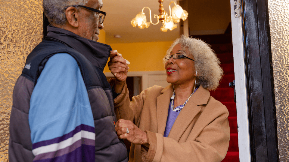 Wife and husband getting ready to leave their home
